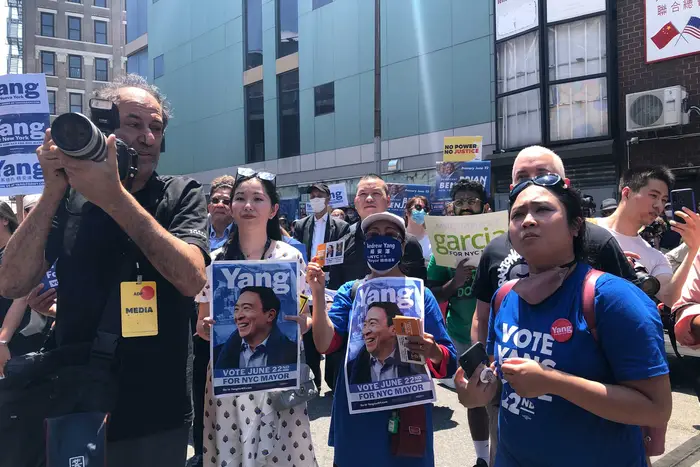 Yang supporters gathered at a get out the vote rally in Chinatown Sunday afternoon.